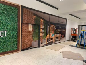 A Contractor Working on a Commercial Wall Covering Installation in Saugus, MA