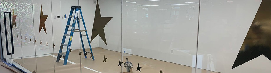 Commercial window vinyl graphic installation in Boston, MA